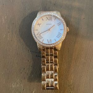 Guess women’s watch, gold